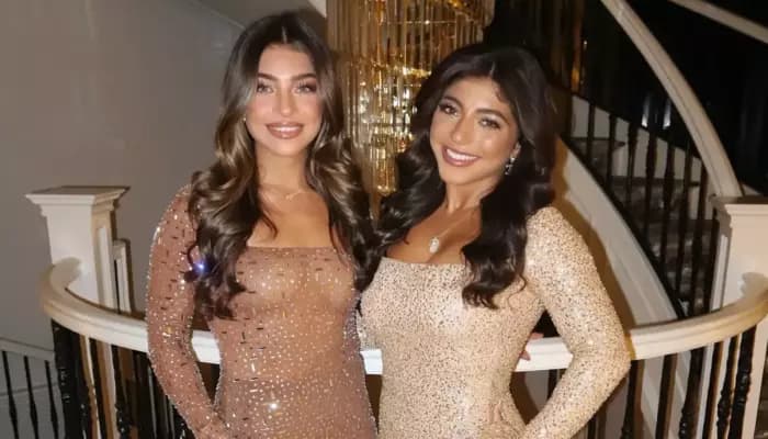 Gia Giudice and Milania Giudice at a public event, both smiling for cameras
