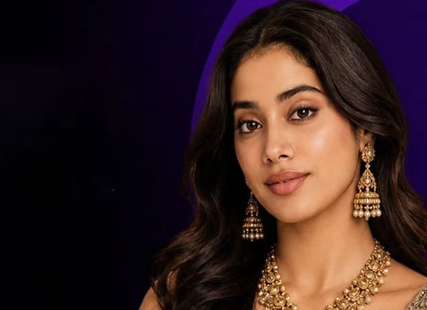 Janhvi Kapoor in a traditional outfit, holding a piece of jewellery from Bhima Jewellers