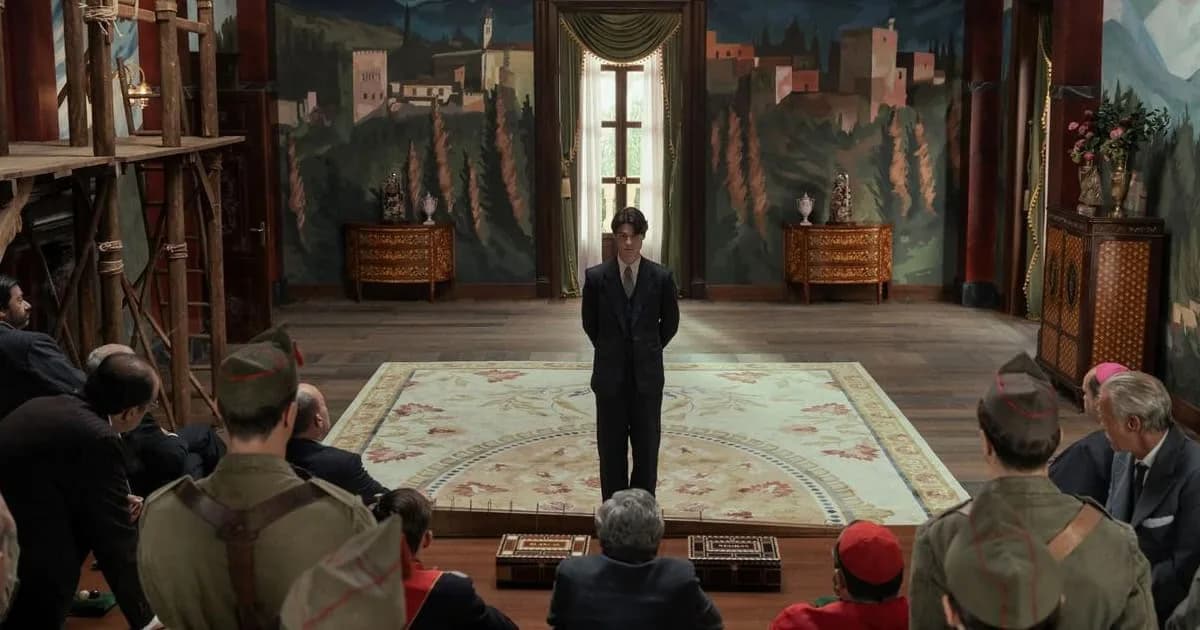 A still from La Bola Negra showing a man in military uniform staring at another man in prison garb, both silhouetted against a dark background